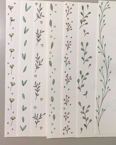 four sheets of stickers with different designs on them, one has flowers and the other has leaves