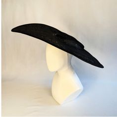 "One very wide sinamay straw hat base in black in an oblong point shape that measures approximately 22.5\" (57cm) long and 18\" (45.7 cm) wide . It has a flat crown that measures 1\" (2.5 cm) high.  The edges of the brim are finished in wired sinamay. The multi-layer stiffened sinamay straw has a great sturdy weave and provides excellent support for your millinery creations. PLEASE NOTE: This is NOT a ready to wear finished hat and will not stay on your head unless you add a head band or elastic Adjustable Wide Brim Evening Hat, Black Sinamay Hats With Curved Brim, Black Brimmed Evening Hat, Freeform Sinamay Hat, Black Moisture-wicking Hat With Curved Brim, Millinery Supplies, Hat Base, Diy Hat, Black Hat