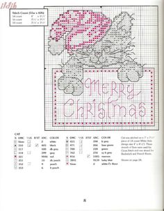 a cross stitch christmas card with a teddy bear