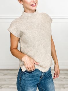 Elevate your style with our Drop Shoulder Short Sleeve Mock Neck Sweater Top! The elegant mock neck and chic drop shoulder design add a touch of sophistication, while the short sleeves keep you cool and comfortable. Perfect for any occasion, this top will effortlessly elevate your wardrobe. Fabric- 98% Polyester, 2% Spandex Shoulder Design, Mock Neck Sweater, Drop Shoulder, Neck Sweater, Mock Neck, Sweater Top, Short Sleeves, Spandex, Wardrobe