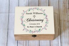 a small wooden box with a wedding date printed on it