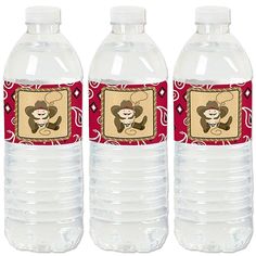 three water bottles with cowboy themed labels on them