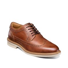 Florsheim-Norwalk Wingtip Oxford Look stylish in your sport coat and dress chinos or a tee-jean combo by pairing the Norwalk Wingtip oxford from Florsheim. The classic lace-up, comprising leather upper, has brogue details and a wingtip front that stay fascinating. A TPU sole ensures reliable support while exhibiting a modern look. Coat And Dress, New Balance Style, Wingtip Oxford, Johnston Murphy, Look Stylish, Sneakers Boots, Sport Coat, Cole Haan, Shoes Online