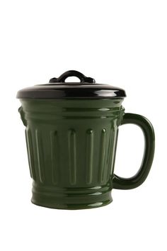 a green coffee cup with a black lid and handle on the side, sitting in front of a white background