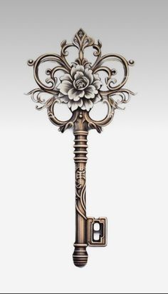 an ornate key with a flower on it