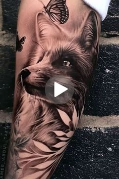 a tattoo with a fox and butterfly on it