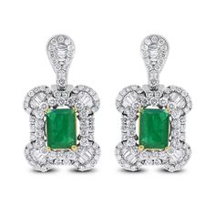 Designed for simplicity & statement, these earrings are a timeless and creative pair. Gemstones Type: Emerald Gemstones Shape: Rectangular Gemstones Weight: 3.12 Gemstones Color: Green Diamonds Shape: Round & Baguettes Side Diamonds Weight: 2.50 ct Side Diamond Color: F - G Side Diamond Clarity: SI (Slightly Included) Metal: 18K White Gold Metal Wt: 8.32 gms Setting: Prong, Pave & Channel Set Length: 1.1 Inches (2.79 cm) Non Threaded Post & Omega Back Closure Gia Certified Emerald Earrings For Formal Occasions, Gia Certified Formal Drop Earrings, Formal Baguette-cut Earrings With Diamond Accents, Formal Baguette Cut Earrings With Diamond Accents, Gia Certified Fine Jewelry Earrings For Formal Occasions, Emerald Cut Diamond Accented Formal Earrings, Emerald Cut Diamond Accent Earrings For Formal Events, Formal Baguette Cut Emerald Earrings, Formal Baguette-cut Emerald Earrings