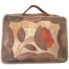 Rare find here, 1960s Char Leather case. It has compartments. Wipstiched, Floral motif. Great distressed look. Measuring 13 in high x 17.5in wide x 2.5 deep. We have more Char pieces on our storefront. Please be sure to check our storefront for more fashion as we have both Vintage and Contemporary fashions. We also have hundreds of pieces of jewelry from New Old Stock (never worn) as well as fine jewelry, southwestern and sterling. We have been selling our collection on here since 2013 and have Painted Handbag, Vintage Briefcase, Vintage Mexico, Oversized Bag, Leather Patchwork, Leather Fanny Pack, Inside Bag, Leather Laptop Bag, Novelty Bags