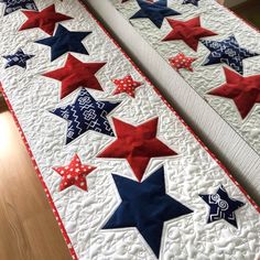 two quilted bedspreads with red, white and blue stars