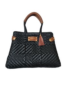 Indulge in luxury while doing your part for the environment with our Less Pollution Convertible Handbag! Handwoven with sustainable materials, this elegant black pearl bag can easily transform into a convenient tote bag. Complete with leather handles, experience style and sustainability all in one bag. HandwovenLined with one zipper pocketMagnetic closure for tote bag.Versatile bag (Tote bag)Made from recycled plasticUpcycle Genuine Leather Straps15" L x 10"H x 6" W Black Designer Handbags, Upcycled Leather, Pearl Bag, Unique Bags, Eco Friendly Fashion, One Bag, Handbags Online, Leather Handles, Sustainable Materials