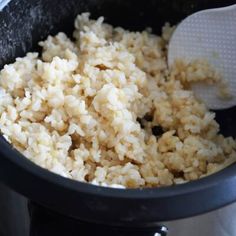 rice being cooked in an electric pressure cooker