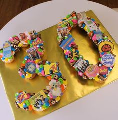 there is a cake that has the number 50 on it, decorated with candy and candies