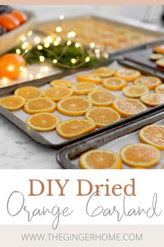 oranges are arranged on trays with the words diy dried orange garland