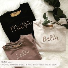 "Personalized & custom hand-embroidered crewneck sweatshirts for children (infant to toddler sizing). These personalized sweaters are great gifts for new baby gifts, birthdays, friends, and family! We have the perfect pink options for your Pink Shirt Day! \"Be Kind\" or \"Kind Is Cool\" are some great ideas to have hand-embroidered on your sweaters! Most of our sweatshirts are long-sleeved in an organic cotton fabric. It has a soft, brushed interior. For majority of sizes, the round neckline has Fall Birthday Cotton Sweatshirt, Custom Embroidered Long Sleeve Tops As Gift, Long Sleeve Tops With Custom Embroidery As Gift, Personalized Cotton Crew Neck Sweatshirt, Embroidered Cotton Top For Birthday, Cotton Top For Birthday In Winter, Cotton Tops For Birthday In Winter, Personalized Cotton T-shirt For Fall, Customizable Family Matching Cotton Sweatshirt