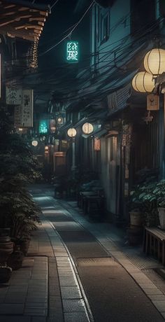 an alley way with lanterns and plants on the side walk at night time in japan