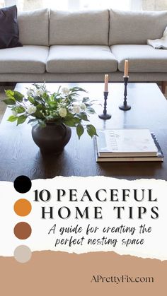 a living room filled with furniture and flowers on top of a coffee table in front of a window