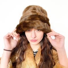 Vintage 90s warm faux fur hat in brown   Material : Acrylic, Polyester. Brown Winter Hat With Faux Fur Lining, Winter Faux Fur Mink Hat, Vintage Brown Cloche Hat For Winter, Brown Brimmed Cloche Hat For Winter, Mink Color Hat With Faux Fur Lining For Winter, Mink Colored Winter Hat With Faux Fur Lining, Purple Beret, Brown Beret, Red Beret