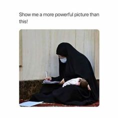 a woman in a black veil writing on a piece of paper with the caption show me a more powerful picture than this