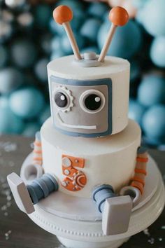 a cake that has some kind of robot on it