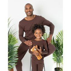 Wearers will love these Mens Two Piece Cotton Pajamas for any time of the year, while they remain cozy and secure thanks to all its comfy qualities. Each outfit is not only imported, but includes a stylish long-sleeved top with breathable bottoms. Both pieces implement ribbed cuffs at the ankles and wrists for that extra slim feeling, while the tagless labels conveniently prevent tag scratches on exposed skin. Options come in many different solid colors such as beige, blue, plus so many others t Brown Long Sleeve Sleepwear, Long Sleeve Pajamas, Cotton Pajamas, Solid Brown, Cotton Pyjamas, Long Sleeve Pyjamas, Stylish Men, Family Members, Cotton Material