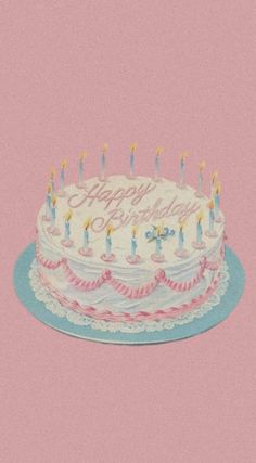 a birthday cake with lit candles on it sitting in front of a pink background that says happy birthday