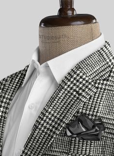 Convey an iconic stance that highlights finesse by donning our Harris Tweed Classic Glen Suit. However, the suit is designed with pure wool fabric, representing thick, generous feelings yet pursuing a robust nature that tackles the cold weather moods with a checks pattern over a black and white tone. Finally, Narrow the suave focus with an elegantly tailored suit that devotes significant warmth with a stylish personality to make a bold statement on any occasion. 
 
 Look Includes  Harris Tweed C Fall Wool Suit With Suit Collar, Wool Suit With Suit Collar For Fall, Wool Suits For Fall, Wool Suits With Suit Collar For Fall, Fall Wool Suits, Classic Houndstooth Suits For Winter, Winter Tweed Business Blazer, Classic Winter Houndstooth Suit, Tailored Wool Suits For Fall