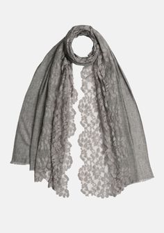 Crafted from luxuriously fine wool, this unique and feminine dark grey melange scarf wraps you in warmth while exuding sophistication. With its refined charcoal tones and tonal-colored lace detailing, it's a must-have addition to your wardrobe. This versatile accessory effortlessly complements any outfit and hence can be worn year round offering comfort and a touch of graceful allure, whether you're dressing up or going for a more casual look. Elegant Fall Cashmere Pashmina Shawl, Elegant Cashmere Shawl Scarf, Elegant Black Cashmere Scarf, Elegant Cashmere Shawl, Elegant Cashmere Winter Scarf, Elegant Fall Pashmina Shawl, Elegant Pashmina Shawl For Fall, Elegant Wool Shawl For Winter, Elegant Winter Pashmina Shawl