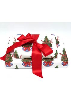 two wrapped presents with red ribbon on white background