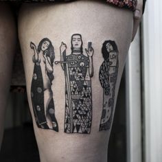 a woman's thigh with tattoos on her legs and two women standing next to each other