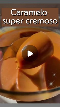 caramel sauce being spooned into a glass bowl