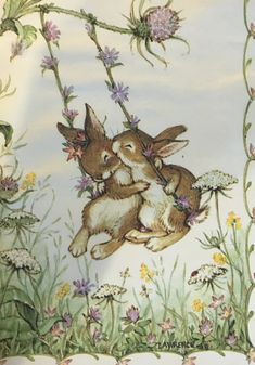 two rabbits sitting on top of each other in the middle of flowers and grass,