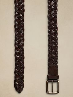 A mastery of impeccable design, this sophisticated belt is made from soft braids of luxurious of leather that make an incredibly intricate, yet sturdy silhouette.  Width: 1. 75" (4. 5cm) Soft Braids, Braided Leather Belt, Braided Leather, Leather Belt, Baby Shop, Banana Republic, Dark Brown, Braids, Man Shop