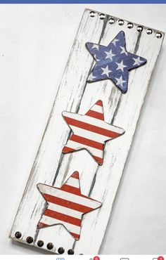 an american flag wooden sign with stars on it