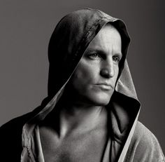 black and white photograph of a man wearing a hoodie