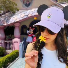 Our 'Daisy' high ponytail hat is made of 100% high quality cotton to be both lightweight and durable. It features an embroidered vibrant Daisy Duck patch, and two premium black mouse ears made to stand up... even on the wildest rides! Details: ONE SIZE FITS MOST ADULTS: Ball cap features an adjustable metal slider on the back of the hat to allow for easy resizing for a snug and comfortable fit 100% COTTON excluding decoration: Adjustable hat is composed of lightweight and durable cotton fabric, Casual Cotton Hats With Mickey Mouse Detail, Casual Cotton Mickey Mouse Hats, Adjustable Cotton Mickey Mouse Hat, Casual Mickey Mouse Baseball Cap, Adjustable Minnie Mouse Cap, Mickey Mouse Baseball Cap, One Size Fits Most, Fun Mickey Mouse Themed Hat One Size Fits Most, Adjustable Novelty Baseball Cap For Spring, Adjustable Mickey Mouse Fun Hat