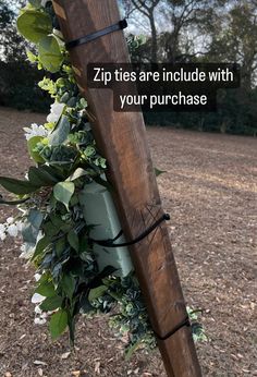 a wooden pole that has some plants growing on it and the words zip ties are include with your purchase