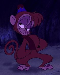 a cartoon monkey with a purple crown on its head sitting in front of a dark background