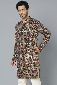 VASTRAMAY Men's Navy Blue Patola Print Ethnic kurta Add a touch of ethnic elegance to your wardrobe with this VASTRAMAY kurta. It features a beautiful navy blue base with a traditional patola print, making it perfect for any special occasion. Features Navy blue color with patola print Mandarin collar Full sleeves Knee length Pockets Specifications Material: Cotton Blend Top Length: Knee Length Sleeve Length: Full Sleeves Material & Care Top Fabric: Cotton Blend Care: Dry Clean Only Legal Disclai Straight Kurta With Motifs For Festivals, Straight Kurta With Motifs For Navratri, Navratri Straight Kurta With Motifs, Transitional Straight Kurta With Motifs, Diwali Printed Straight Kurta, Diwali Puja Kurta With Block Print, Diwali Puja Block Print Kurta, Straight Kurta With Block Print For Puja, Festive Printed Straight Kurta