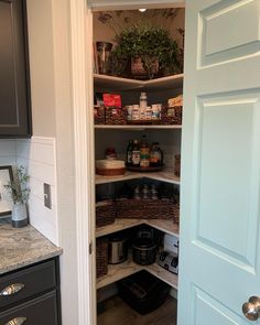 an open pantry with lots of food in it