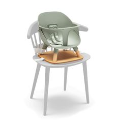 the high chair is designed to look like a baby's seat