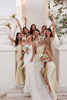 a group of bridesmaids posing for a photo