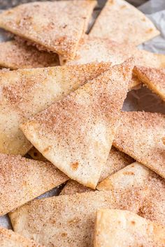 a pile of crackers sitting on top of a piece of foil covered in seasoning