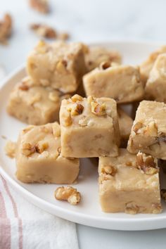 maple walnut fudge on a white plate with the title in black text above it