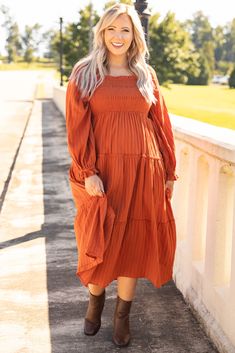 This dress is perfect for a day in the countryside or in the concrete jungle! This dress has a solid sunset orange color you can dress up or down for every occasion! It's comfortable for all-day wear, and has a figure-flattering flowy fit! Style this dress with booties or heels for your next event! 100% Cotton Solid Color Fall Beach Maxi Dress, Fall Beach Midi Dress In Solid Color, Fall Beach Orange Maxi Dress, Flowy Orange Maxi Dress For Day Out, Casual Orange Dresses For Fall, Orange Fall Maxi Dress For Day Out, Fall Orange Maxi Dress For Brunch, Orange Maxi Dress For Fall Day Out, Orange Maxi Dress For Fall Brunch