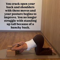 a woman is doing yoga on a mat in front of a wall with a quote