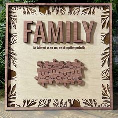 a wooden puzzle with the words family on it