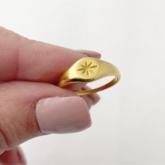 This listing is for one Gold North Star Signet Ring. Stainless Steel 18k Gold plated Super trendy, excellent quality, Stainless Steel: non tarnish & Hypo-allergenic Gold Star-shaped Signet Ring For Promises, Gold Star Shaped Signet Ring For Promise, North Star Ring, Gold Heart Ring, Thick Ring, Gold Statement Ring, Tarnished Silver, Jewelry Care Instructions, Etsy Gold Ring