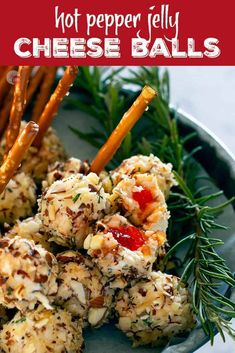 cheese balls on a plate with rosemary sprigs