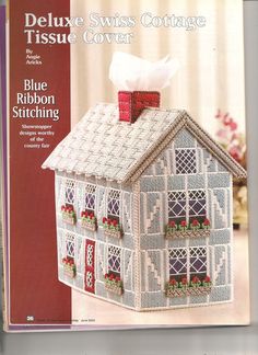 the front cover of a magazine with a house made out of crocheted fabric