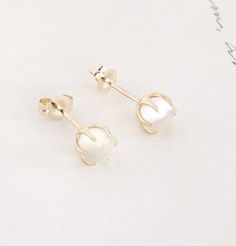 Moonstone Crystal Ball Earrings | Erica Weiner Elegant White Orb-shaped Jewelry, Elegant Gold Crystal Earrings With Moonstone, Elegant Moonstone Round Stone Jewelry, Elegant White Moonstone Crystal Earrings, White Spherical Jewelry For Gifts, White Spherical Jewelry Gift, Elegant Moonstone Earrings For Gift, Elegant Moonstone Earrings As Gift, Elegant Moonstone Earrings For Formal Occasions